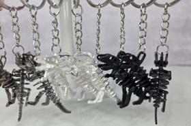 Kit Com 12 Chaveiros Dinossauro T Rex Fóssil 4 Cores cor: Variada Kit Com 12 Chaveiros Dinossauro T Rex Fóssil 4 Cores cor: Variada