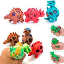 Kit Com 2 Dinossauro Esmagamon Squishy Ball Anti Stress De Apertar
