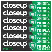 Kit Creme Dental Close Up Triple Menta 70g - 6 Unidades Kit Creme Dental Close Up Triple Menta 70g - 6 Unidades