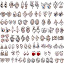 Kit de arte de unhas TAMHOO 100 Pingentes de unhas Fusiform Gold com strass