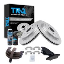 Kit de pastilhas e discos de freio TRQ cerâmicos com revestimento G para Cadillac CTS 2008-2014