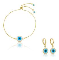 Kit Elisabete - Pulseira Regulável Olho Grego Branco + Brinco Banhado em Ouro 18k