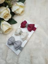Kit Faixa de bebê com 3 laços.