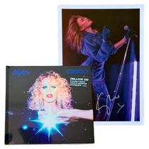 Kylie Minogue - CD DISCO + Litografia Autografada Chalkys Kylie Minogue - CD DISCO + Litografia Autografada Chalkys