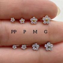 Labret titânio flor perfecta com zircônias cravadas Labret titânio flor perfecta com zircônias cravadas