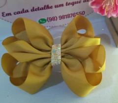 Laço boutique duplo no bico de pato Laço boutique duplo no bico de pato