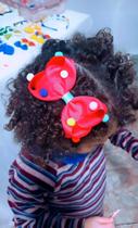 Laço com pompons