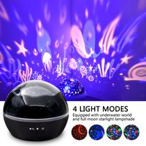 Lâmpada colorida de projeção de estrelas e lua rotativas à luz noturna