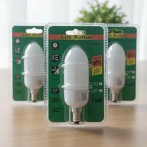 Lâmpada Vela 9w Fluorescente Amarela 2700k 350lm