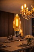 Lâmpada Vela Led Filamento C35 4w E27 Retrô Âmbar P/ Lustre 127/220v 2200k Branco Quente Lâmpada Vela Led Filamento C35 4w E27 Retrô Âmbar P/ Lustre 127/220v 2200k Branco Quente