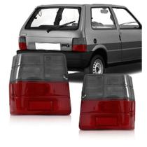 Lente lanterna traseira uno direita fume 1984 em diante Lente lanterna traseira uno direita fume 1984 em diante