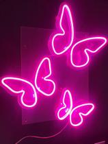 Letreiro neon trio de borboleta