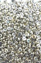 Letrinhas redonda Douradas com letras pretas Letrinhas redonda Douradas com letras pretas