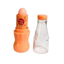 Lip Balm Magic Trick Turma da Lu Laranja Refrigerante