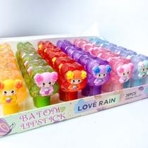 Lip gloss glitter formato borboleta infantil com bonequinha