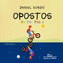 Livro - Opostos on the table