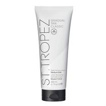 Loção ST TROPEZ Gradual Tan Firming 200 ml, vegana e livre de crueldade