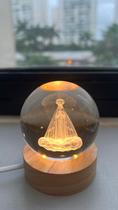 Luminária de Mesa Abajur 3D Cristal Nossa Senhora Aparecida Led 2W 3000K Bivolt Luminária de Mesa Abajur 3D Cristal Nossa Senhora Aparecida Led 2W 3000K Bivolt