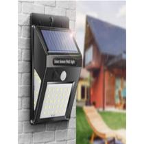 Luminaria Refletor Arandela Com Painel Solar 30 Led's Branco Frio 6k Com Sensor De Movimento Prova D' Água