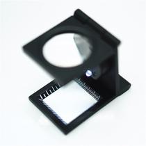 Lupa Conta Fios 10x dobrável em metal, led e escala + bolsa