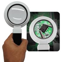 Lupa Multifuncional Com Iluminação e Ângulo Articulável Ideal Para Leitura TH7020B Lupa Multifuncional Com Iluminação e Ângulo Articulável Ideal Para Leitura TH7020B