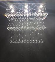 Lustre de cristal para sala de estar/jantar com 50cm de altura, base de inox espelhado 70x20cm