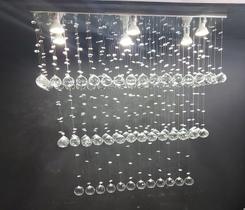 Lustre de cristal para sala de estar/jantar com 80cm de altura, base de inox espelhado 70X20cm