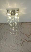 Lustre de Cristal para sala de jantar/estar com 70cm de altura e base de inox 20x20cm Lustre de Cristal para sala de jantar/estar com 70cm de altura e base de inox 20x20cm
