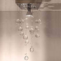 Lustre em cristais K9 para lavabo com 30cm de altura e base de inox espelhada de 14x14cm Lustre em cristais K9 para lavabo com 30cm de altura e base de inox espelhada de 14x14cm