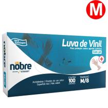 Luva de Vinil Descartável Tamanho M/8 com Pó Ambidestra Cx/100. Acabamento interno Talcado