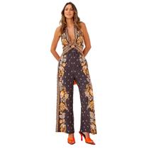 Macacão feminino gola halter decote profundo estampa tropical