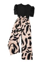 Macacão feminino WDIRARA preto com manga bufante estampada 7Y Macacão feminino WDIRARA preto com manga bufante estampada 7Y
