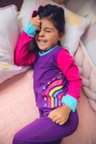 Macacão Magnético Roxo, detalhes pink e azul anil com estampa arco-íris - 9 meses