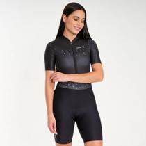 Macaquinho de Ciclismo Feminino Márcio May Moove Star Preto Manga Curta Forro em Gel 9h Macaquinho de Ciclismo Feminino Márcio May Moove Star Preto Manga Curta Forro em Gel 9h