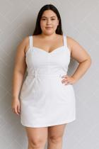 Macaquinho plus size com saia na frente