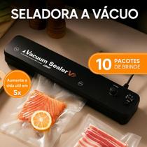 Máquina Seladora Vácuo para Alimentos, Compacta e Eficaz Bivolt Máquina Seladora Vácuo para Alimentos, Compacta e Eficaz Bivolt