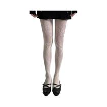 Meia-calça de malha de renda vazada branca e preta com fundo de vime floral