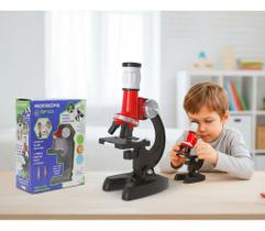 Microscopio com suporte para celular