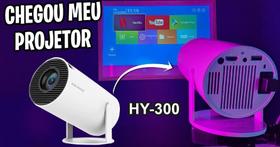 Mini Projetor HY300 PLUS Wifi Portátil 5G Android é a solução que vai transformar sua forma de curtir filmes, jogos e apresentações. Projetor e Smart Mini Projetor HY300 PLUS Wifi Portátil 5G Android é a solução que vai transformar sua forma de curtir filmes, jogos e apresentações. Projetor e Smart