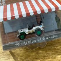Miniatura - 1:64 - 1942 Willys MB Jeep with UN Security Officer - The Hobby Shop 11 - Greenmachine Greenlight