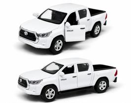 Miniatura Carrinho de ferro Hilux abertura de portas 12 CM Cor:Branco Miniatura Carrinho de ferro Hilux abertura de portas 12 CM Cor:Branco