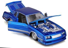 Miniatura Carro Chevrolet Monte Carlo SS - Lowriders (1986) - Azul - 1:24 - Maisto Design Miniatura Carro Chevrolet Monte Carlo SS - Lowriders (1986) - Azul - 1:24 - Maisto Design