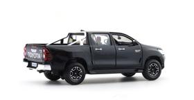 Miniatura de metal Toyota Hilux escala 1:27 maisto