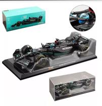 Miniatura Fórmula 1 Mercedes Benz W14 E Performance - 63 G. Russell (2023) - AMG Petronas - 1:24 - Burago C/ Acrílico