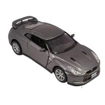 Miniatura Nissan GT-R R35 2009 Kinsmart 1/36 Metal e Fricção Chumbo