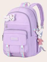 Mochila roxa com adereços Mochila roxa com adereços