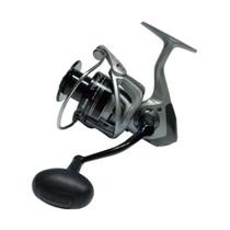 Molinete Okuma Tomcat 8000 7 Rolamentos Drag 16kg Recolhimento 4.8:1 Grafite Cor:Prata Molinete Okuma Tomcat 8000 7 Rolamentos Drag 16kg Recolhimento 4.8:1 Grafite Cor:Prata