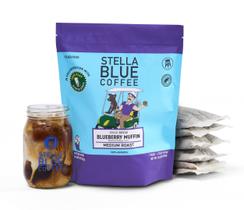 Muffin de mirtilo Stella Blue Big Cat com café gelado 6x