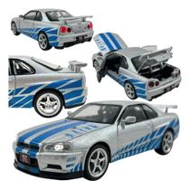 Nissan Skyline GTR R34 Brian Velozes e Furiosos Carro Miniatura Metal Acende Faróis Friccao Som 1:24 Nissan Skyline GTR R34 Brian Velozes e Furiosos Carro Miniatura Metal Acende Faróis Friccao Som 1:24