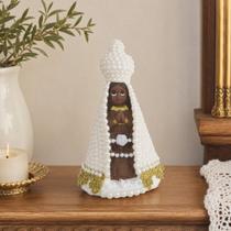 Nossa Senhora Aparecida Baby 15cm com Pérolas gesso Nossa Senhora Aparecida Baby 15cm com Pérolas gesso